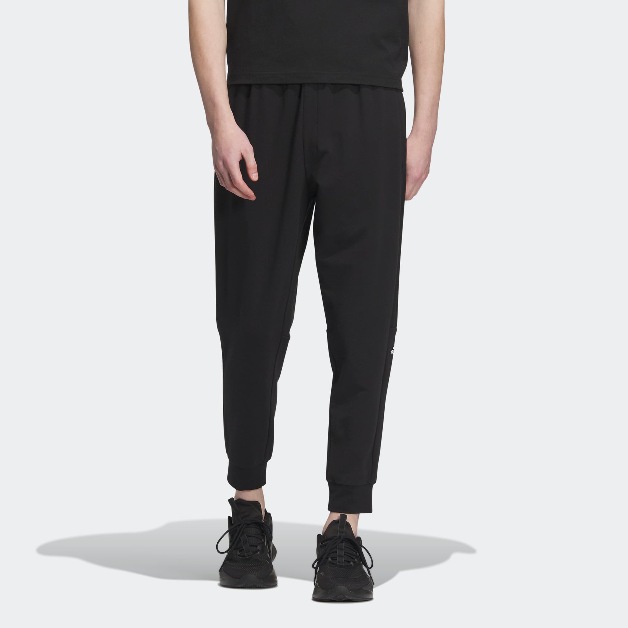 Мужские брюки adidas MUST HAVES KNIT PANTS черно-белые