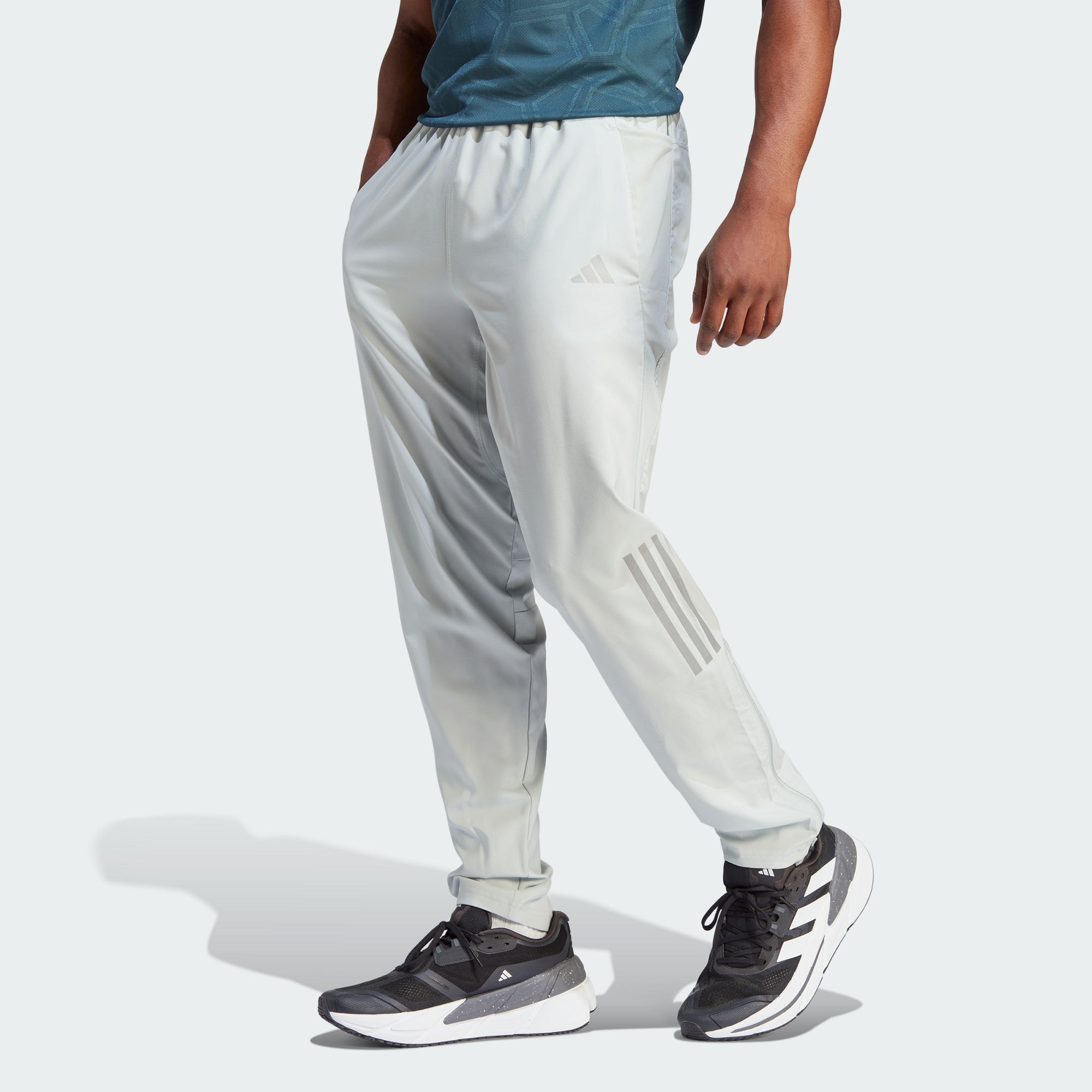 Мужские брюки adidas OWN THE RUN WOVEN ASTRO PANTS