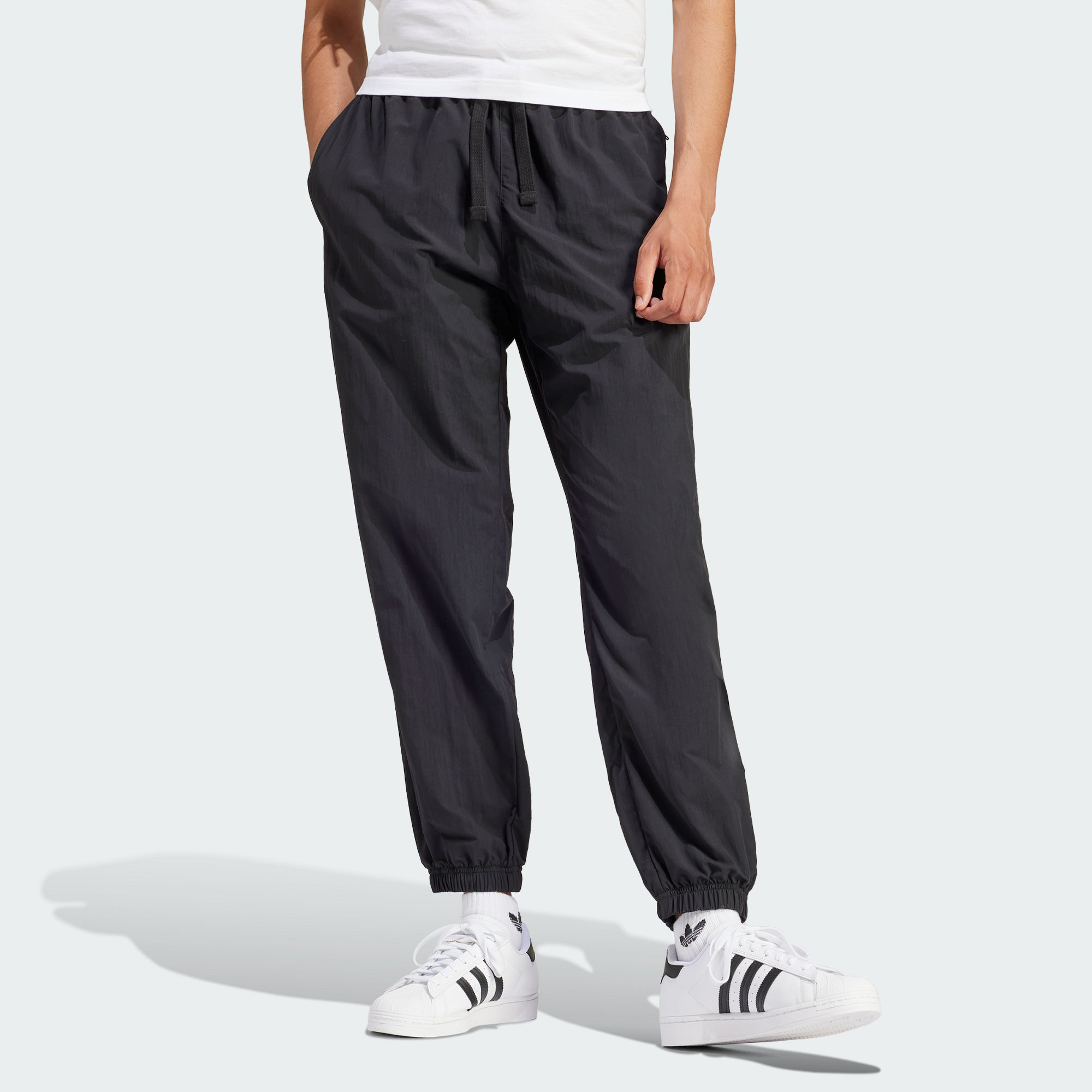 Мужские брюки adidas PREMIUM ESSENTIALS SWEAT PANTS черные