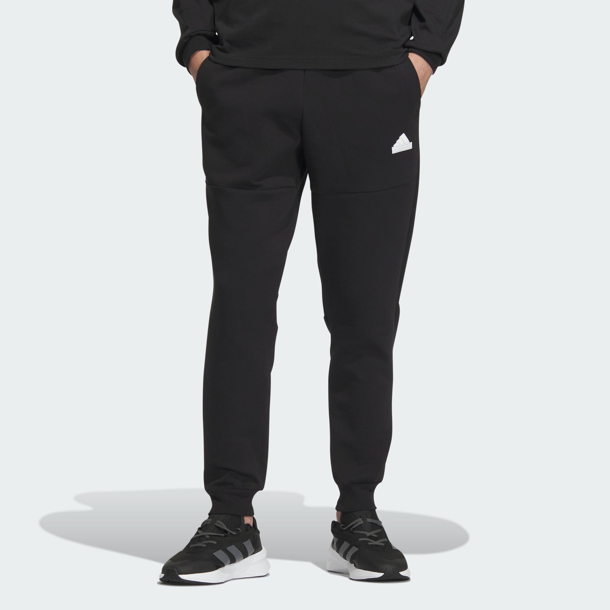 Мужские брюки adidas CITY ESCAPE KNIT PANTS черные