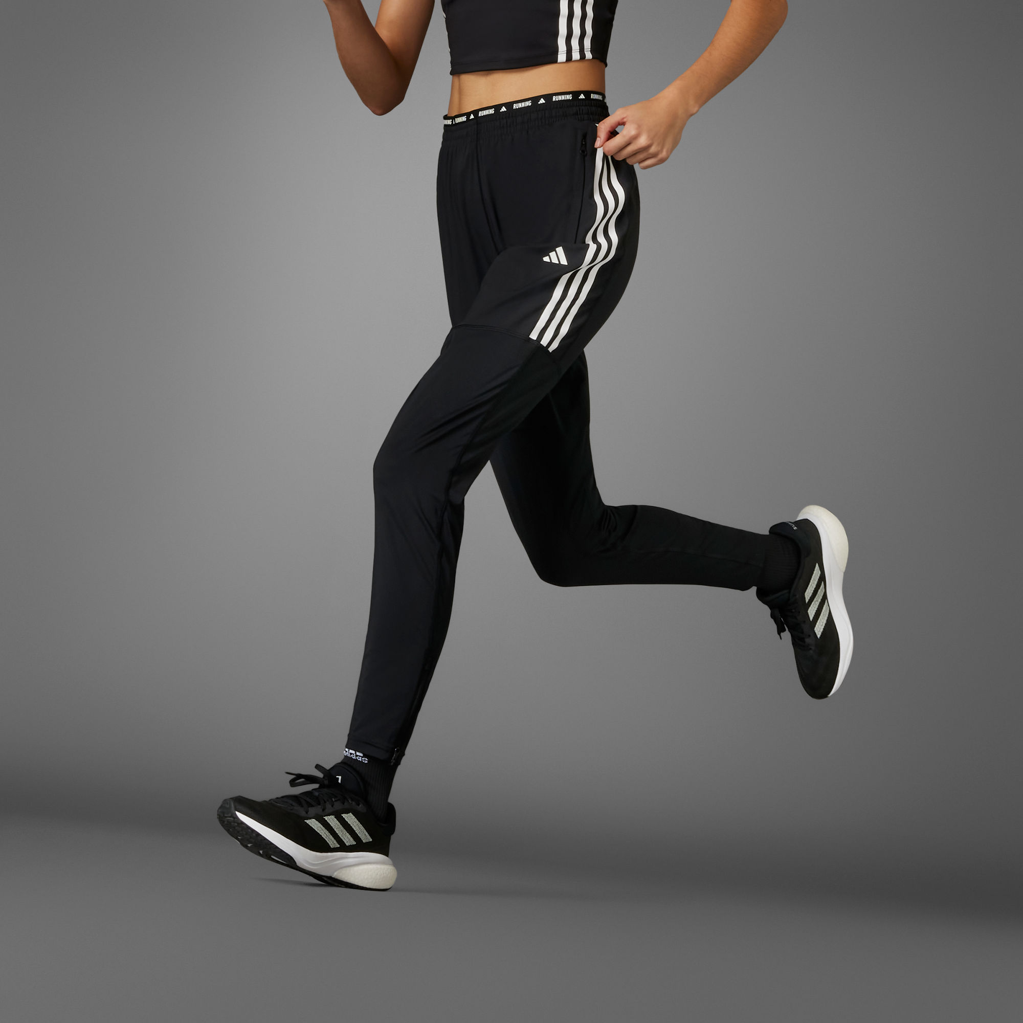 Женские брюки adidas OWN THE RUN 3-STRIPES JOGGERS