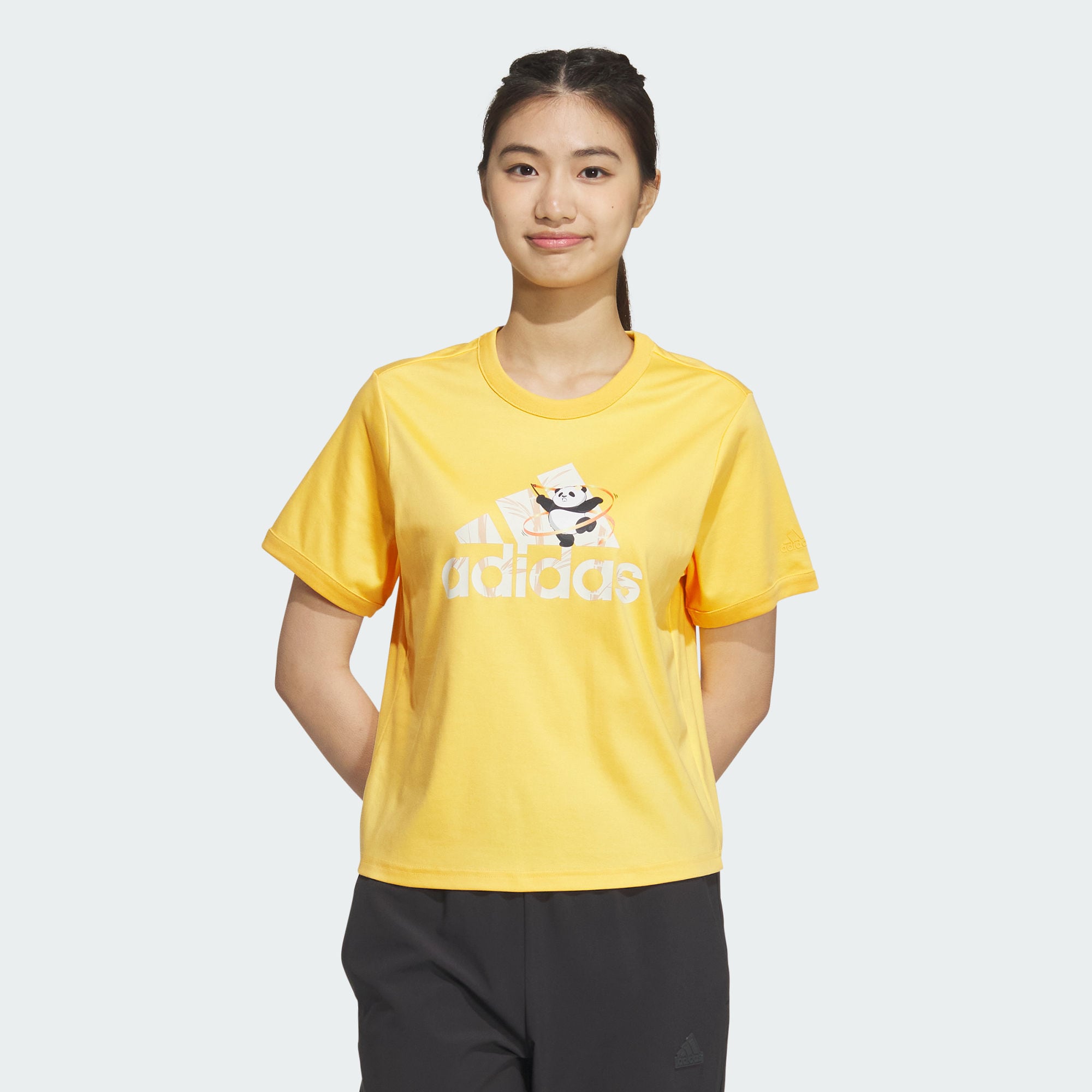 Женская футболка adidas T-SHIRT WITH BADGE OF SPORT GRAPHIC желтая