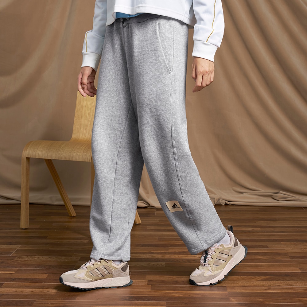 Женские брюки adidas LOUNGE BARREL-LEG PANTS серые