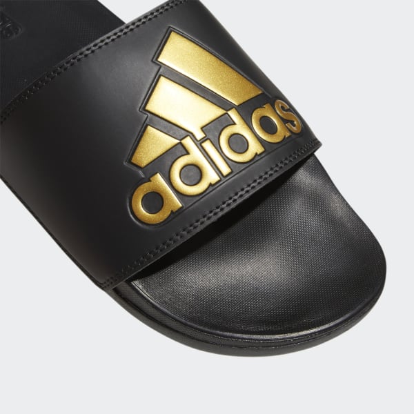 Adidas adilette 2025 gold and black