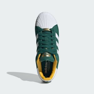 Adidas green deals and gold trainers