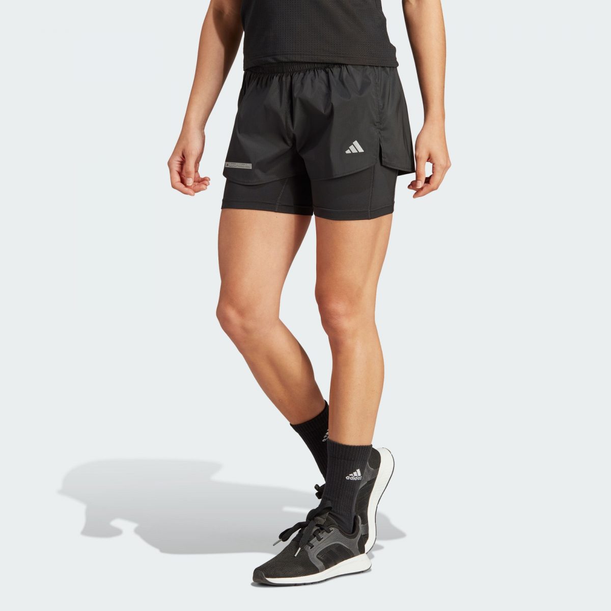 Женский мат adidas ULTIMATE TWO-IN-ONE SHORTS фото