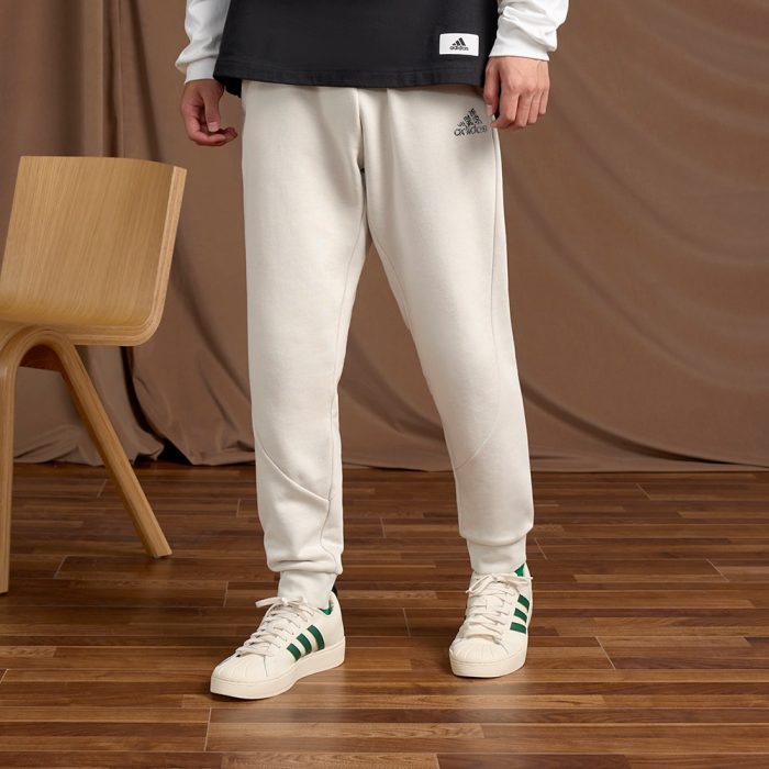 Мужские брюки adidas STADIUM BADGE OF CUFFED PANTS