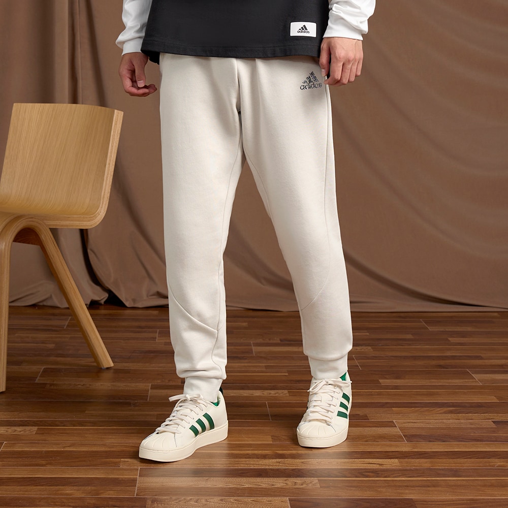 Мужские брюки adidas STADIUM BADGE OF CUFFED PANTS фото