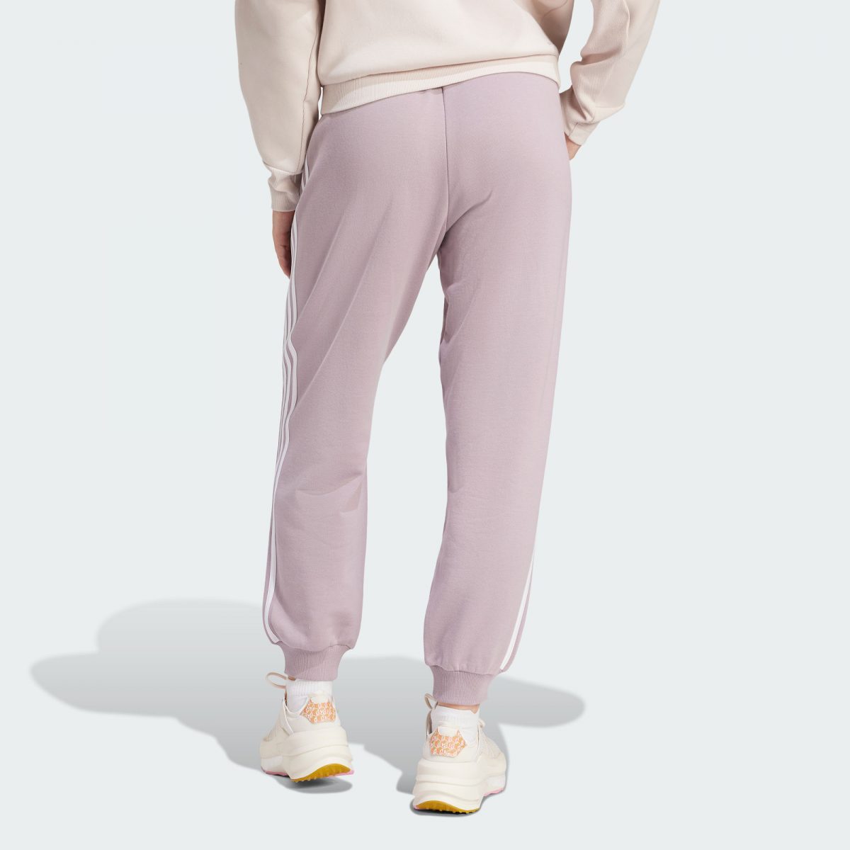 Женские брюки adidas ESSENTIALS LOOSE-FIT PANTS фотография