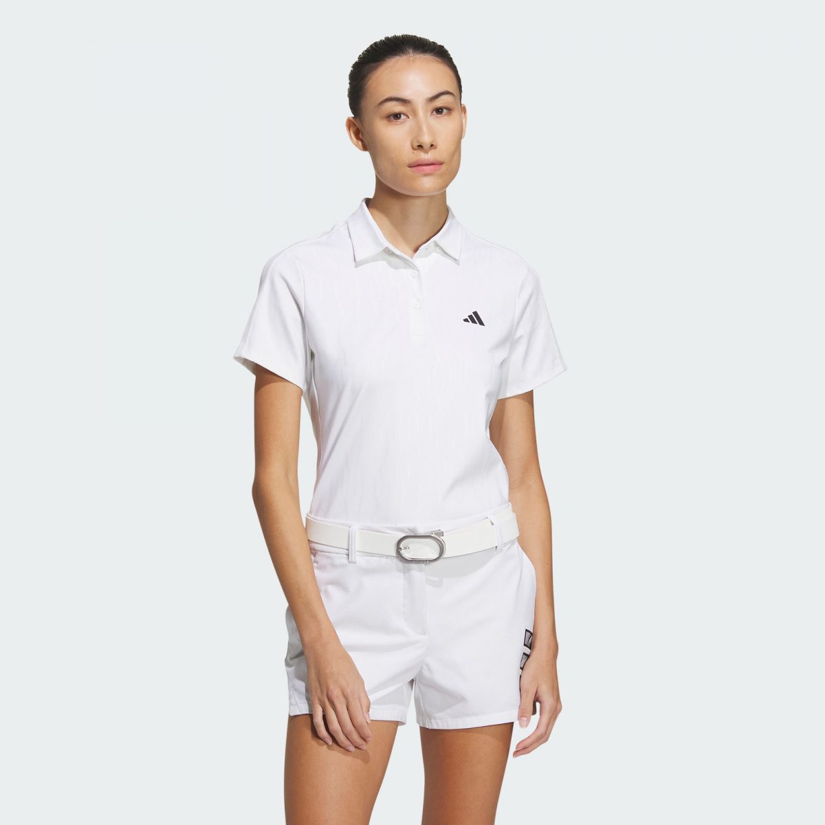 Женская футболка adidas HEAT.RDY DEBOSSED POLO SHIRT белая фото