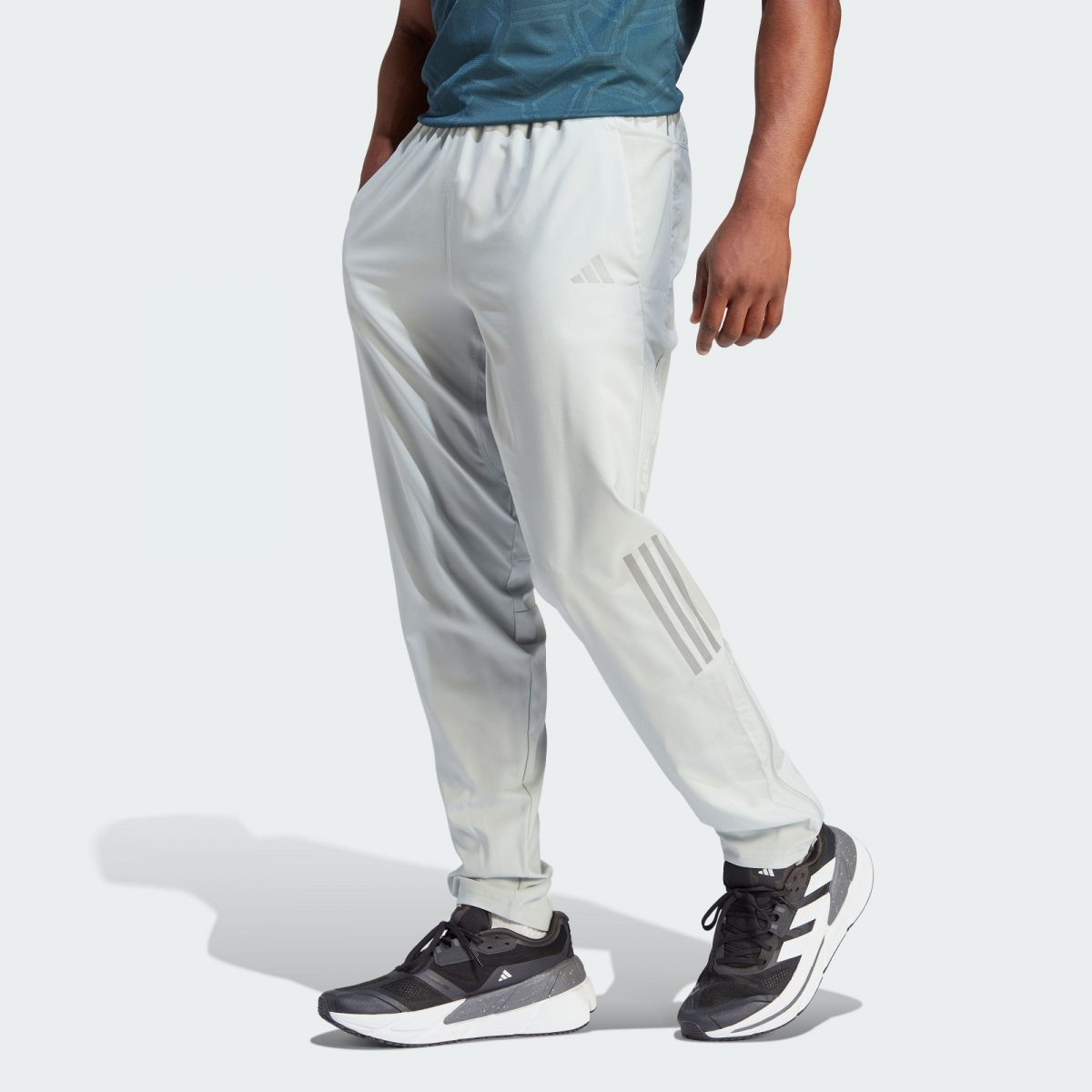 Мужские брюки adidas OWN THE RUN WOVEN ASTRO PANTS фото