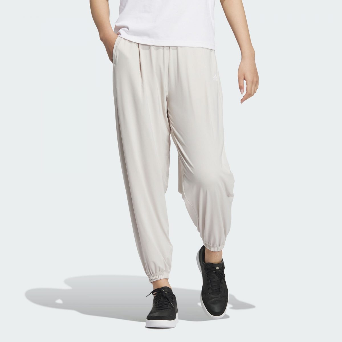 Женские брюки adidas KNIT UPF PANTS серые фото