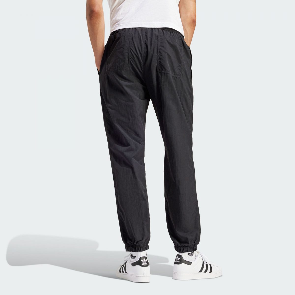 Мужские брюки adidas PREMIUM ESSENTIALS SWEAT PANTS фотография