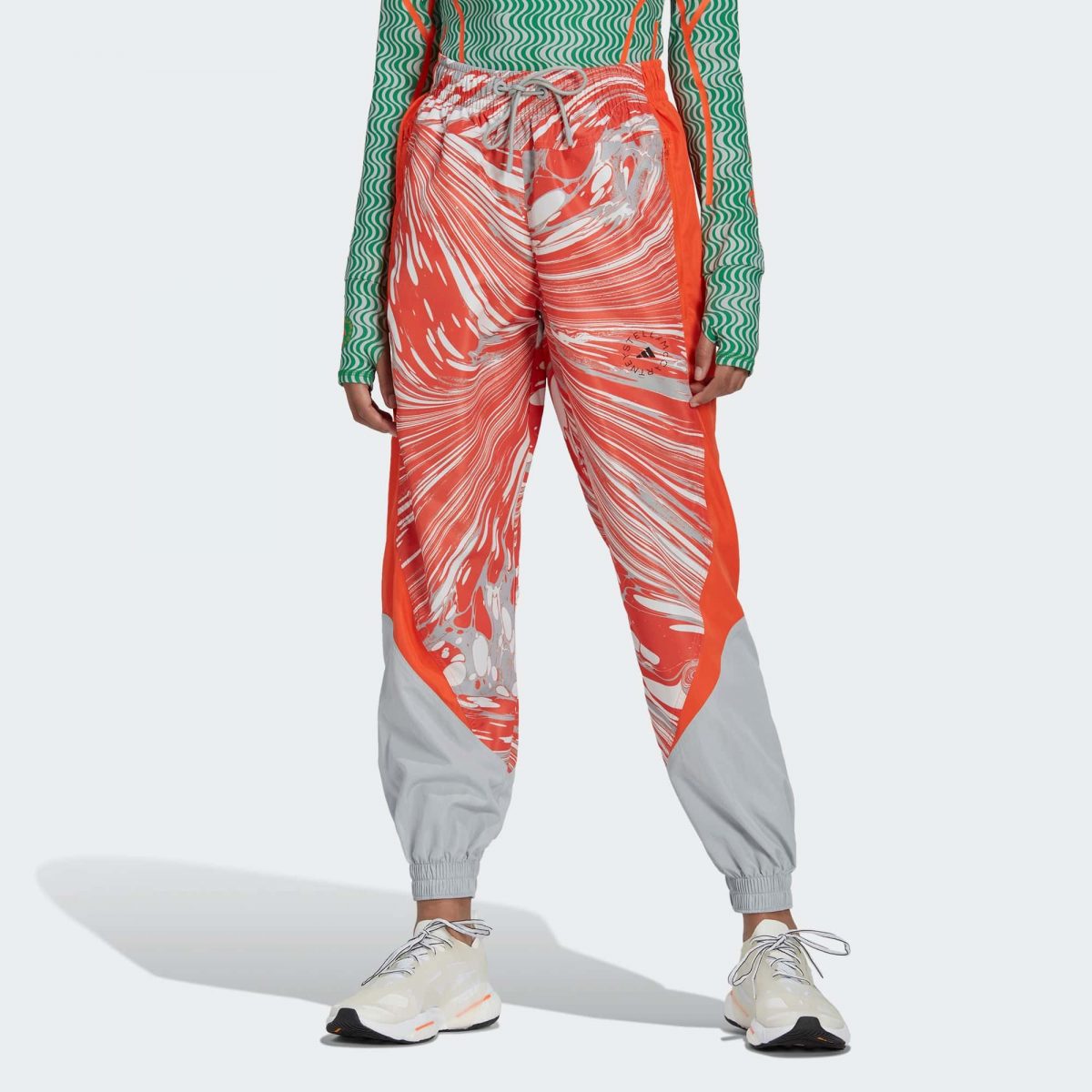 Женские брюки adidas PRINTED WOVEN TRACK PANTS фото