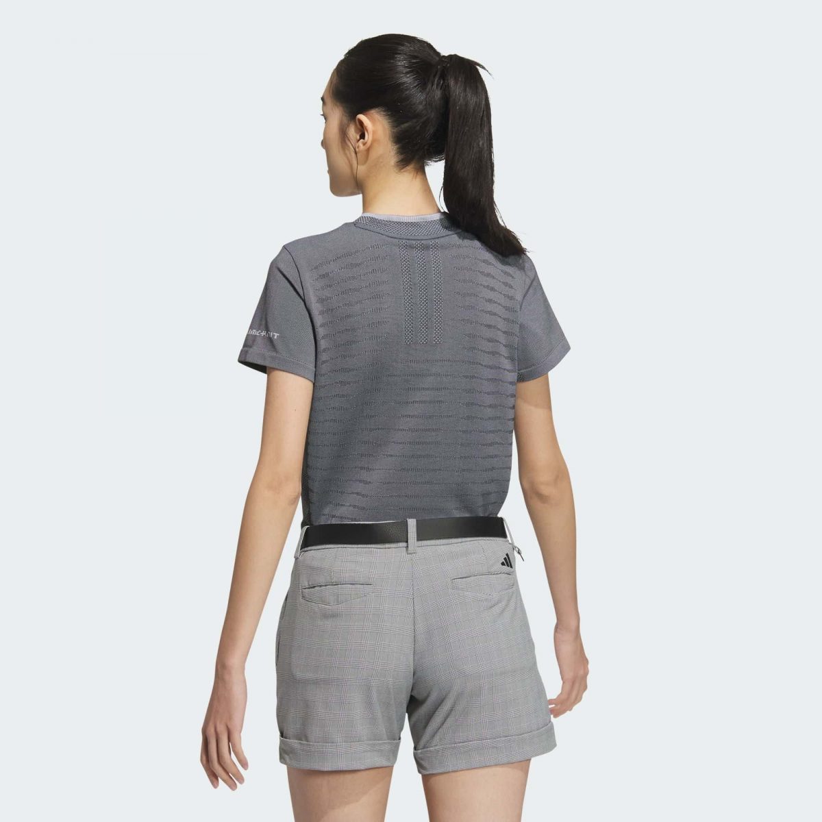 Женская футболка adidas PRIMEKNIT SEAMLESS MOCK SHIRT черно-белая фотография