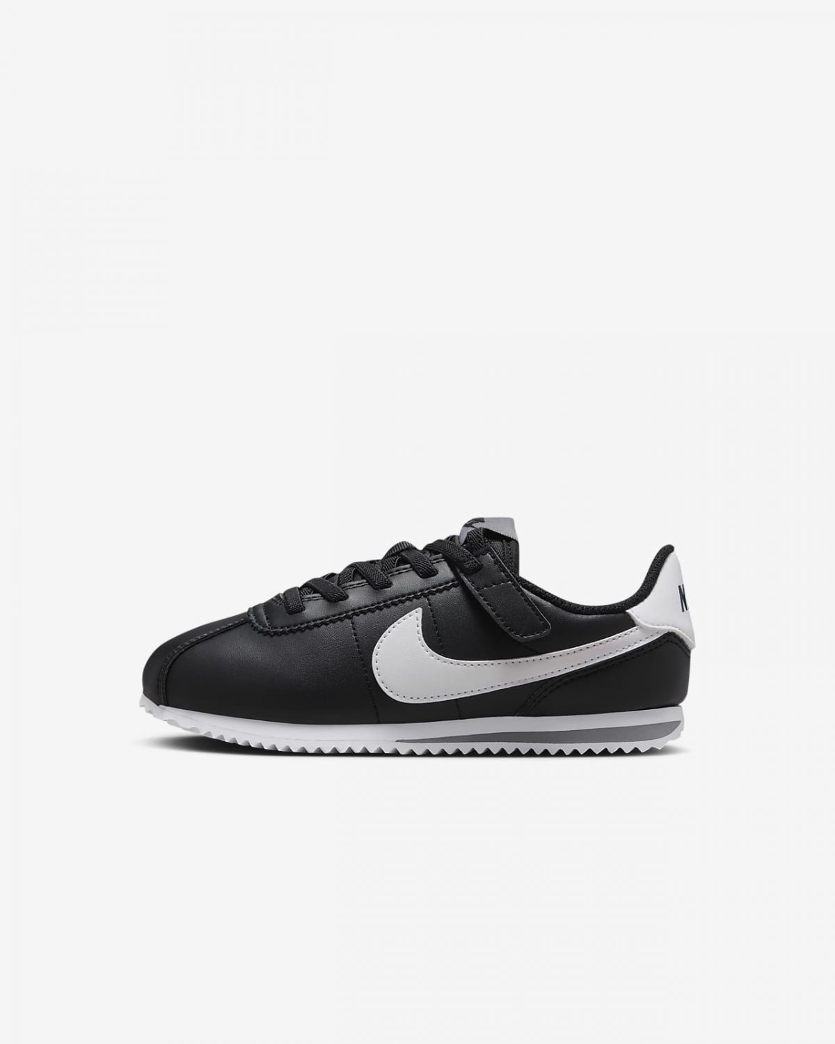 Nike cortez black and white price on sale