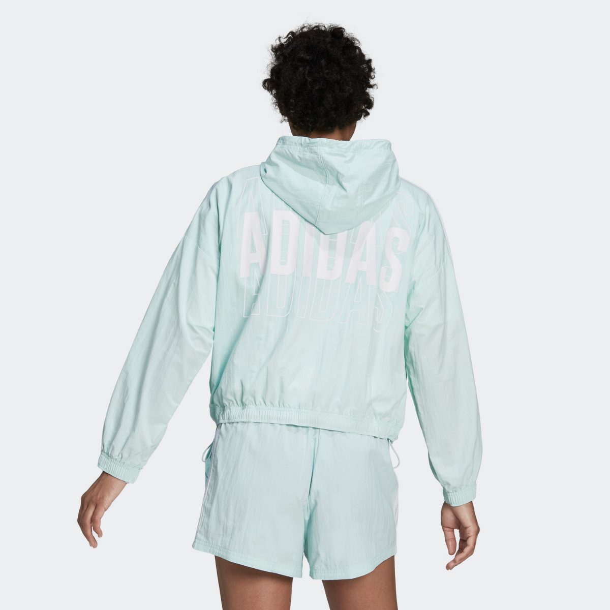 Женская куртка adidas ESSENTIALS REPEAT LOGO WINDBREAKER фотография