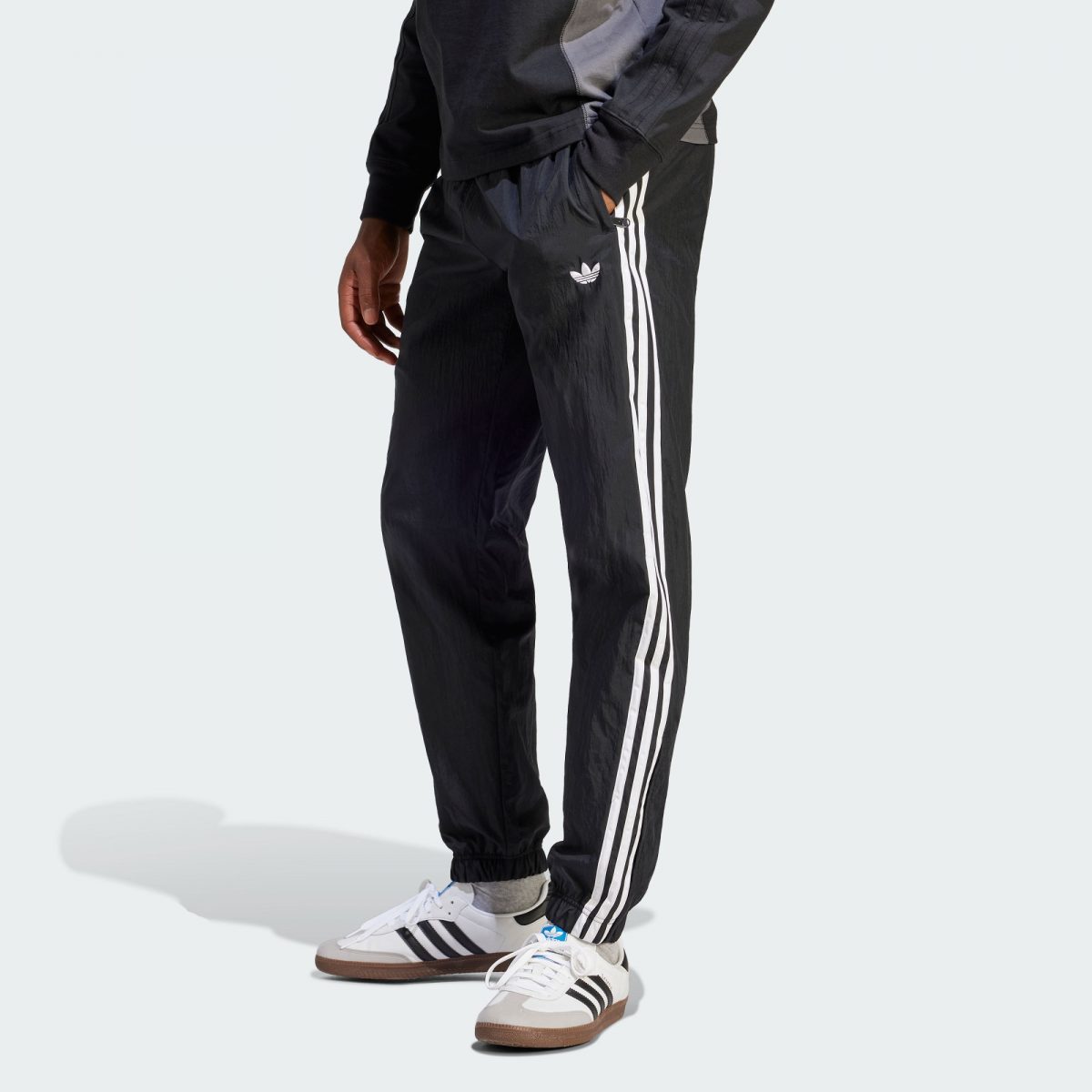 Мужские брюки adidas REKIVE WOVEN TRACK PANTS фото