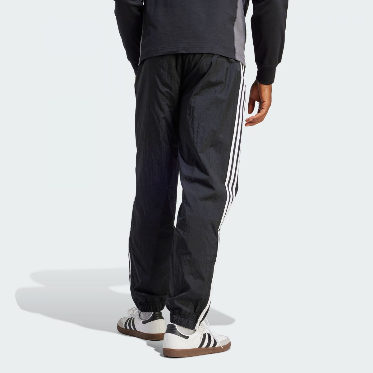 Мужские брюки adidas REKIVE WOVEN TRACK PANTS фотография